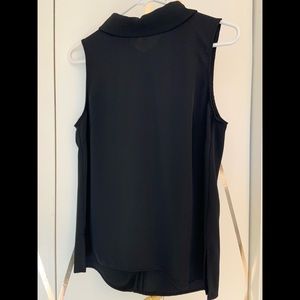 Sleeveless shell top with rolled collar